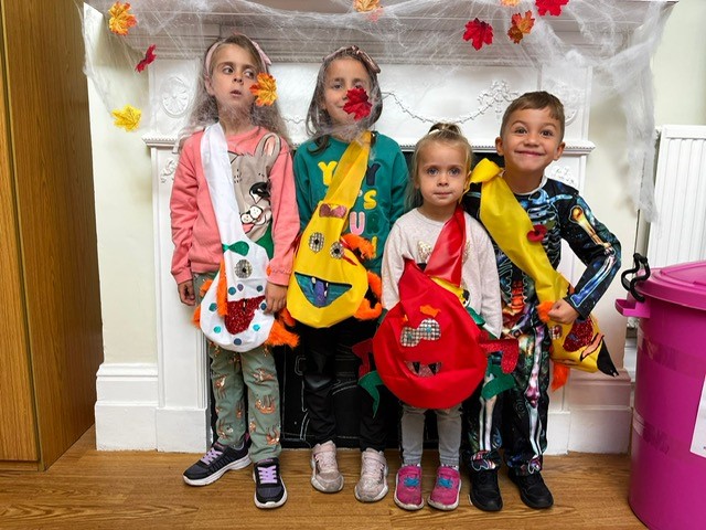 Picture of children with their handmade Halloween bags 2022